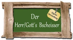 Der Herr/Gott's Bscheisser — Schild der Maultaschen-Manufaktur